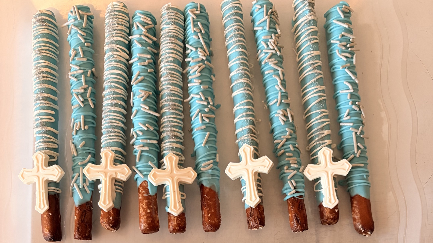 Pretzel Sticks with icing and cross